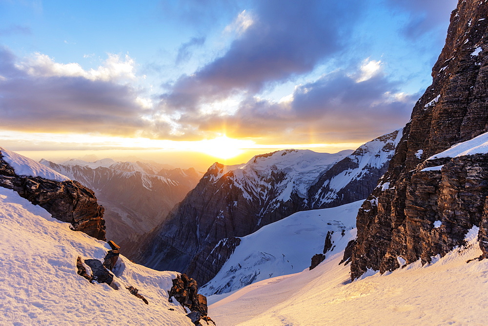 Tent at Camp 4 at 6100m on Peak Korzhenevskaya, 7105m, at sunset, Tajik National Park (Mountains of the Pamirs), UNESCO World Heritage Site, Tajikistan, Central Asia, Asia