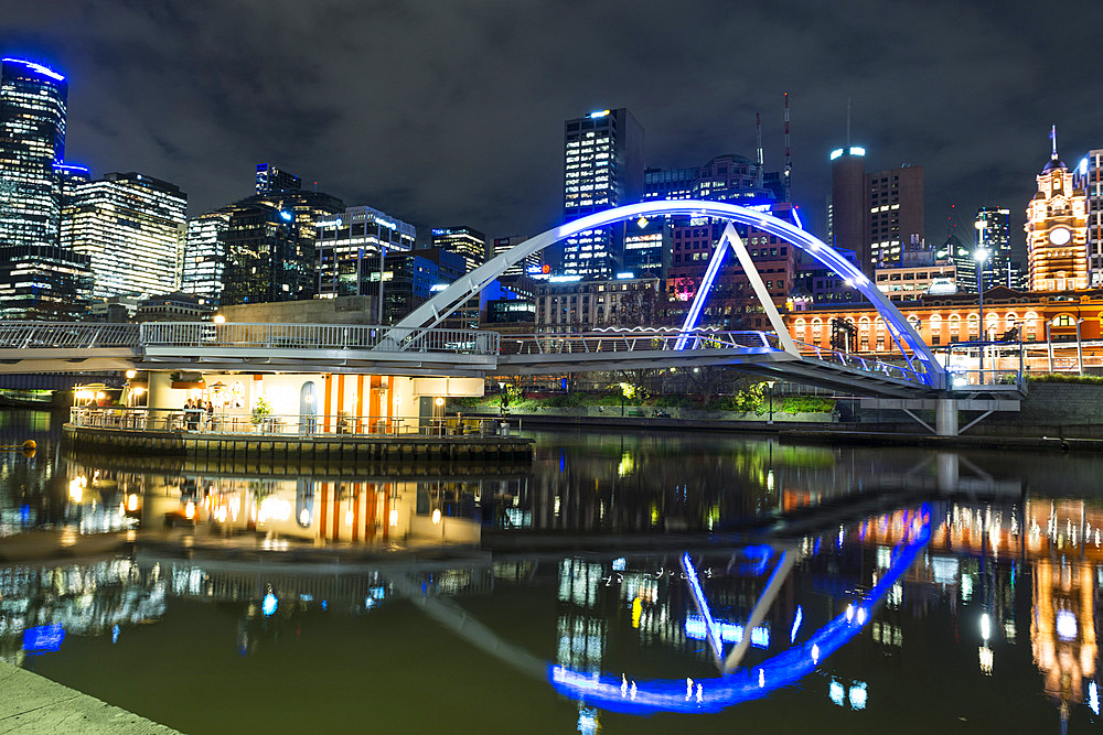 Evan Walker Bridge, and Flinders Street Station along Yarra River, City of Melbourne at twillight, Victoria, Australia, Pacific