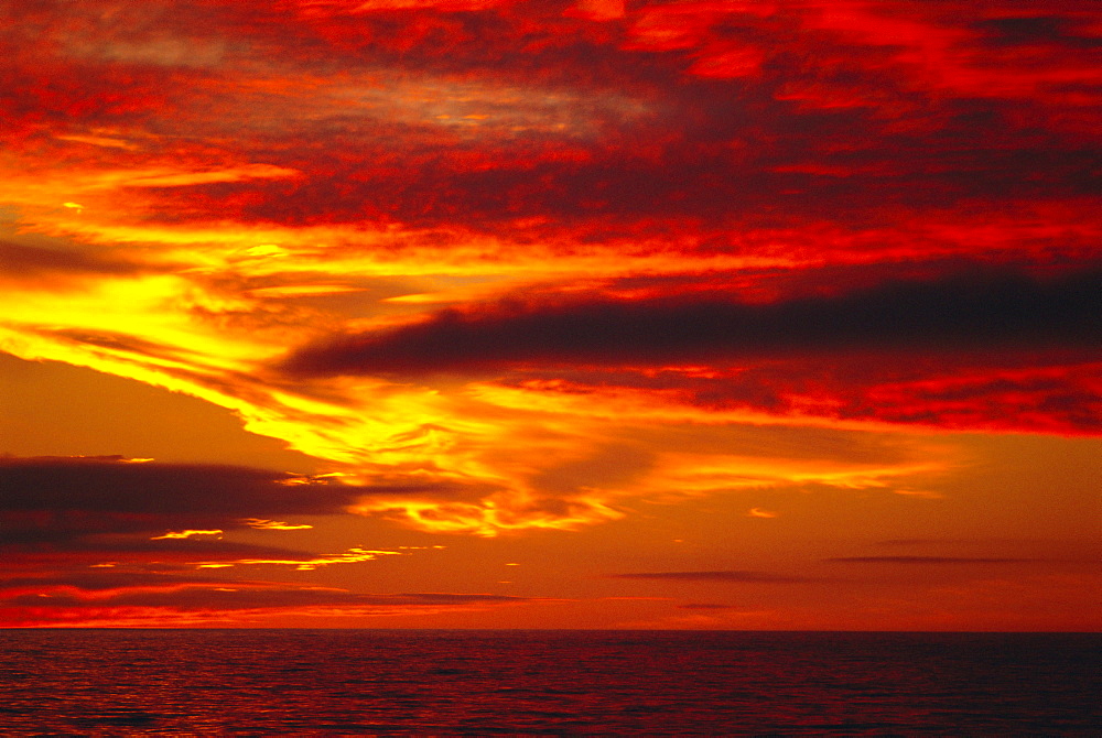 Dramatic sky and red clouds at sunset, Antarctica,, Polar Regions