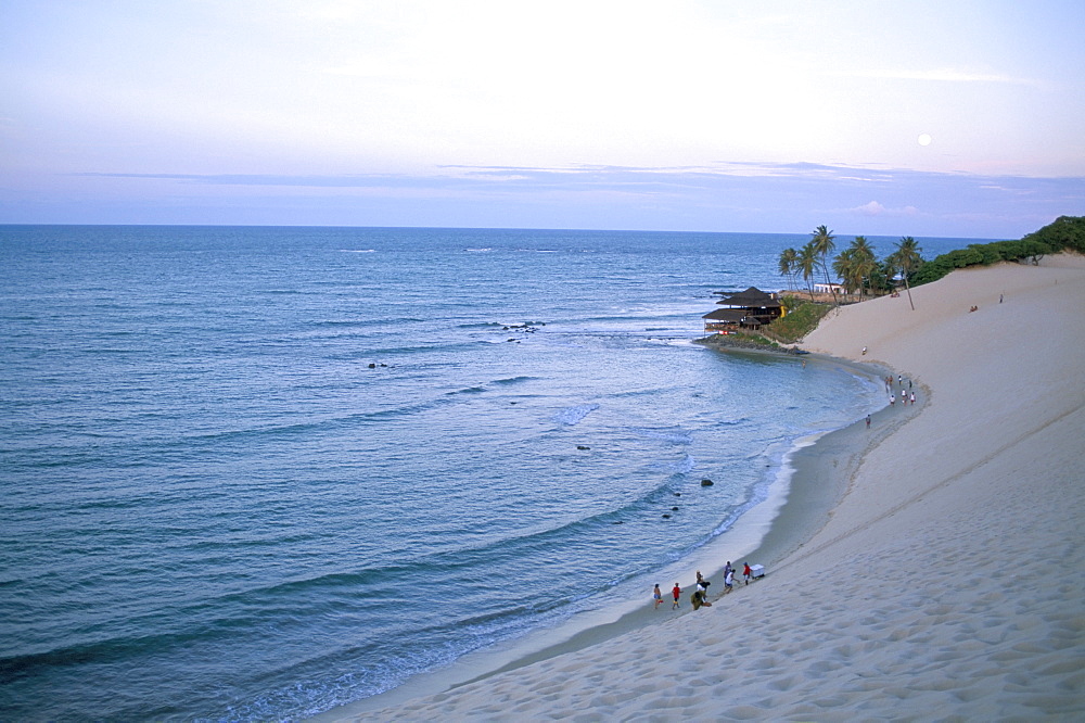 Beach, dunes and Bar 21 at dusk, Genipabu, Natal, Rio Grande do Norte state, Brazil, South America