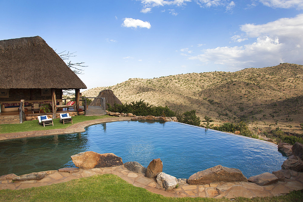 Infinity pool and view from Borana luxury safari lodge, Laikipia, Kenya, East Africa, Africa