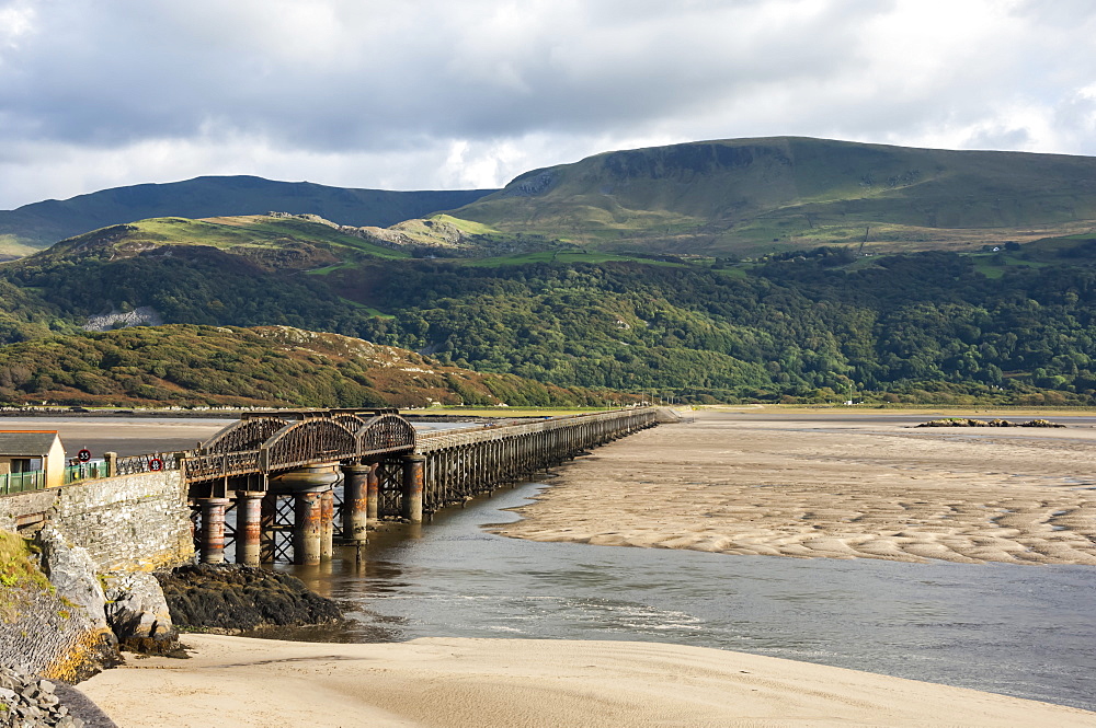 Barmouth Bridge (Viaduct), largely wooden construction, on Cambrian Coast Railway across River Mawddach, Cardigan Bay, Gwynedd, Wales, United Kingdom, Europe