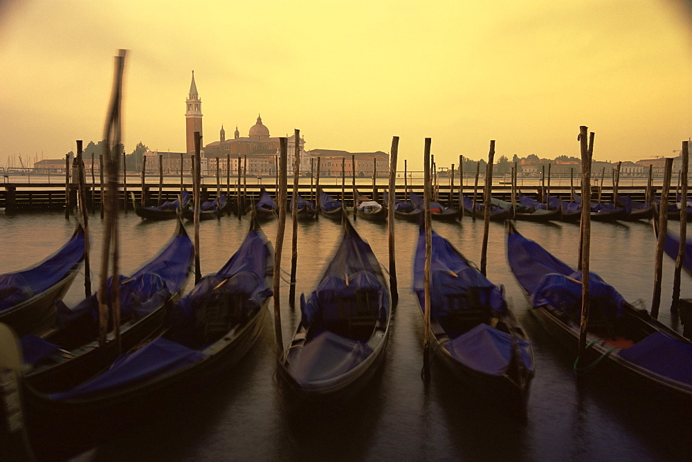 Row of gondolas at dawn, San Giorgio Maggiore, Venice, Veneto, Italy, Europe