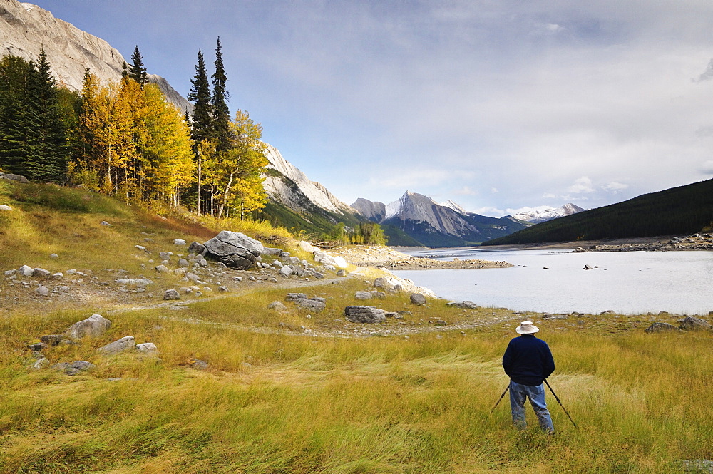 Photographer at Medicine Lake, Jasper National Park, UNESCO World Heritage Site, Rocky Mountains, Alberta, Canada, North America