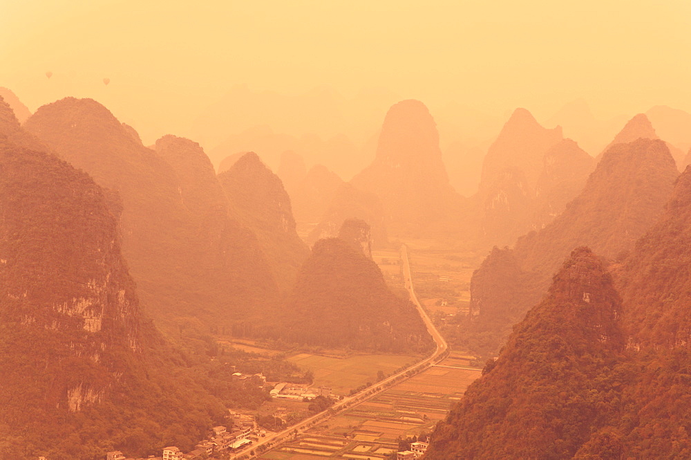 Karst landscape and morning haze, Yangshuo, Guangxi Province, China, Asia