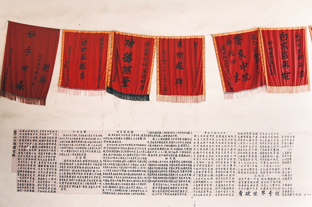 Flags and paper with Chinese characters, Nan Feng Temple, Jinbao, Guangxi Province, China, Asia