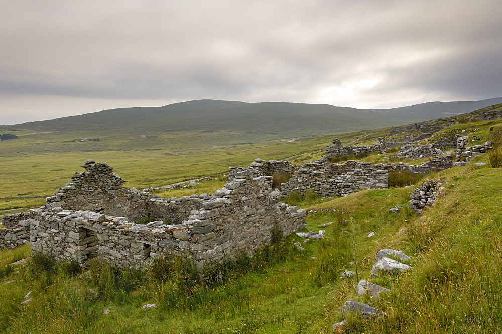 Deserted village at the base of Slievemore mountain, believed to have been abandoned during the great famine, Achill Ireland, County Mayo, Connacht, Republic of Ireland (Eire), Europe