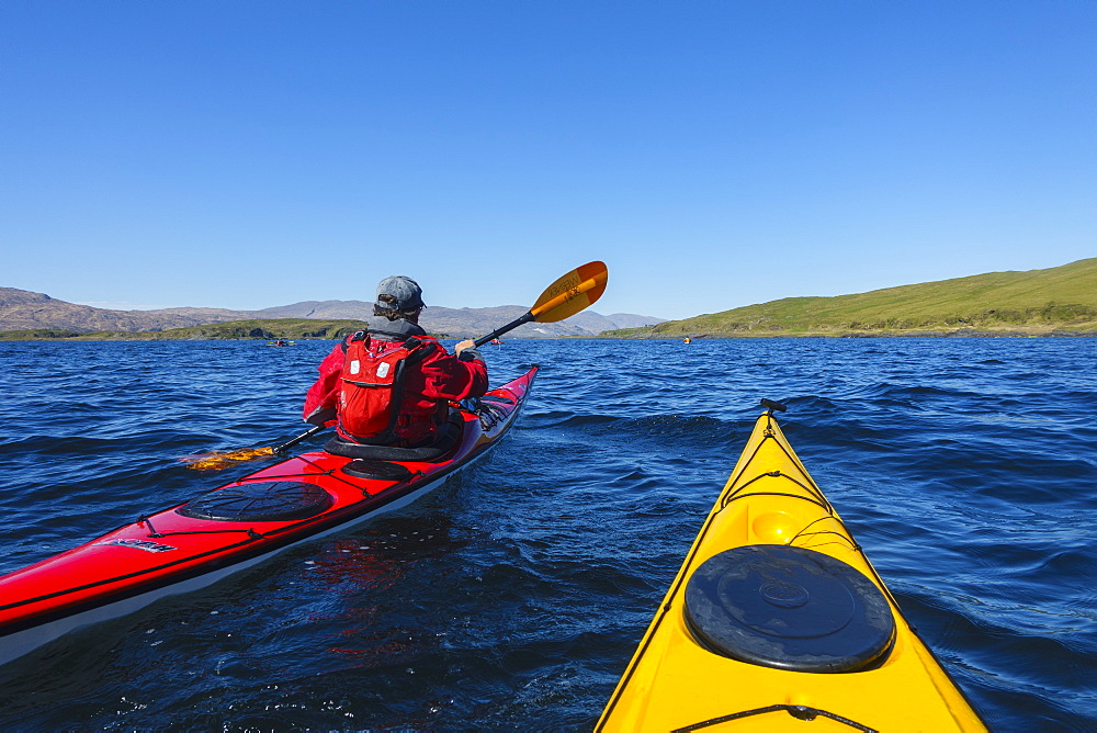 Sea kayaking around the Inner Hebrides, Scotland, United Kingdom, Europe