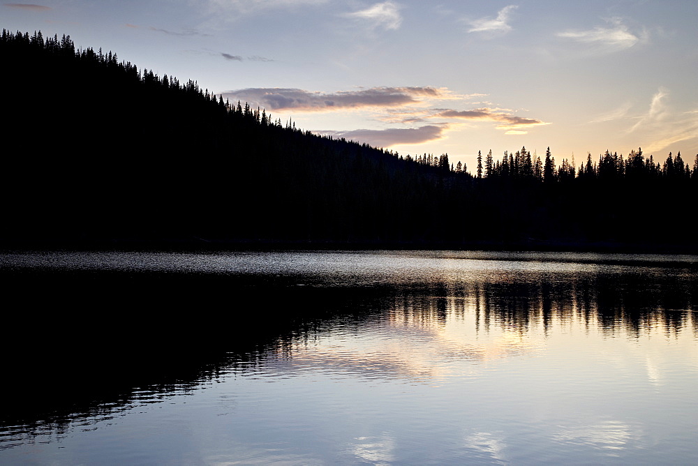 Sunset behind Mirror Lake, Gunnison National Forest, Colorado, United States of America, North America