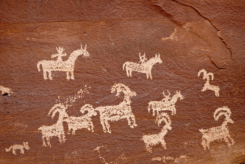 Bighorn hunt petroglyph panel, Arches National Park, Utah, United States of America, North America