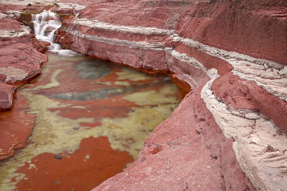 Cascade on the creek through Red Rock Canyon, Waterton Lakes National Park, Alberta, Canada, North America