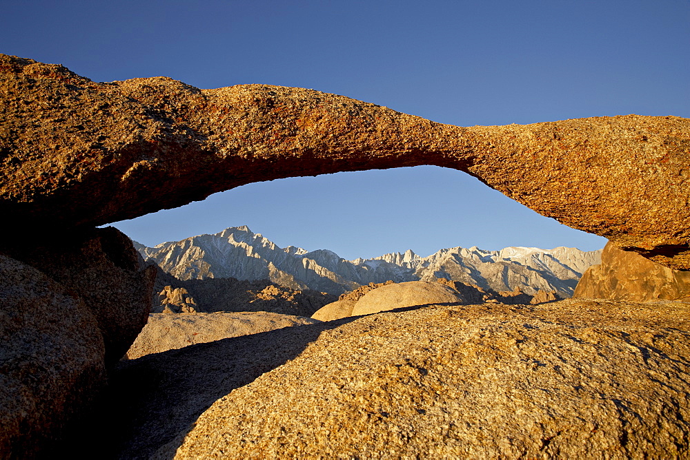 Lathe Arch framing Mount Whitney at first light Alabama Hills, Inyo National Forest, California, United States of America, North America