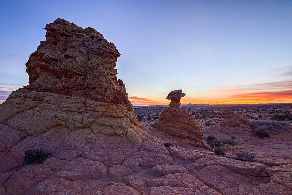 Sandstone formation at dawn with orange clouds, Coyote Buttes Wilderness, Vermilion Cliffs National Monument, Arizona, United States of America, North America