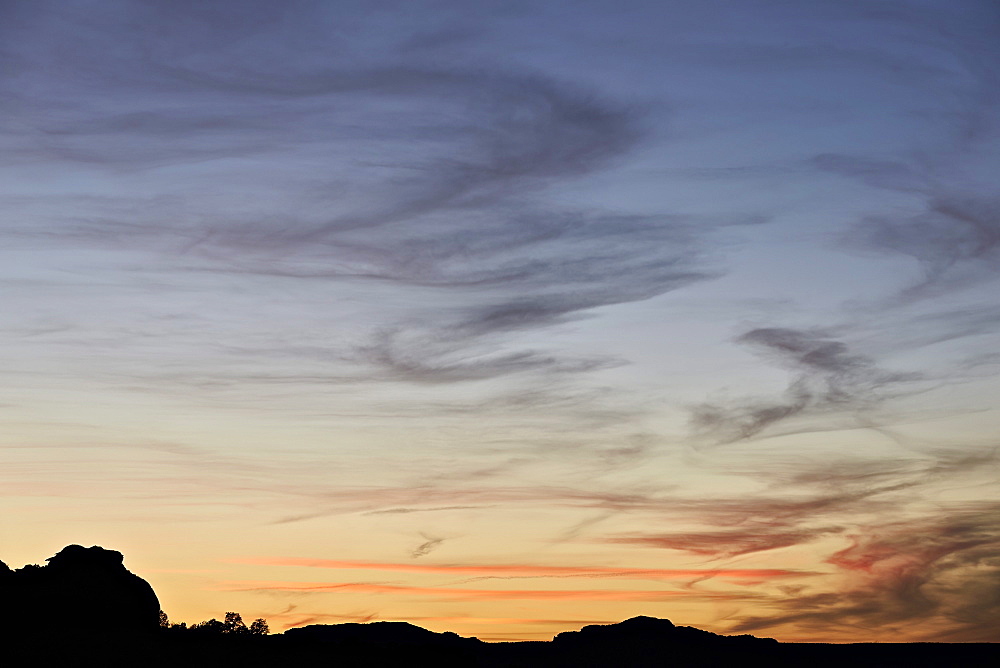 Wispy clouds at sunset, White Pocket, Vermilion Cliffs National Monument, Arizona, United States of America, North America