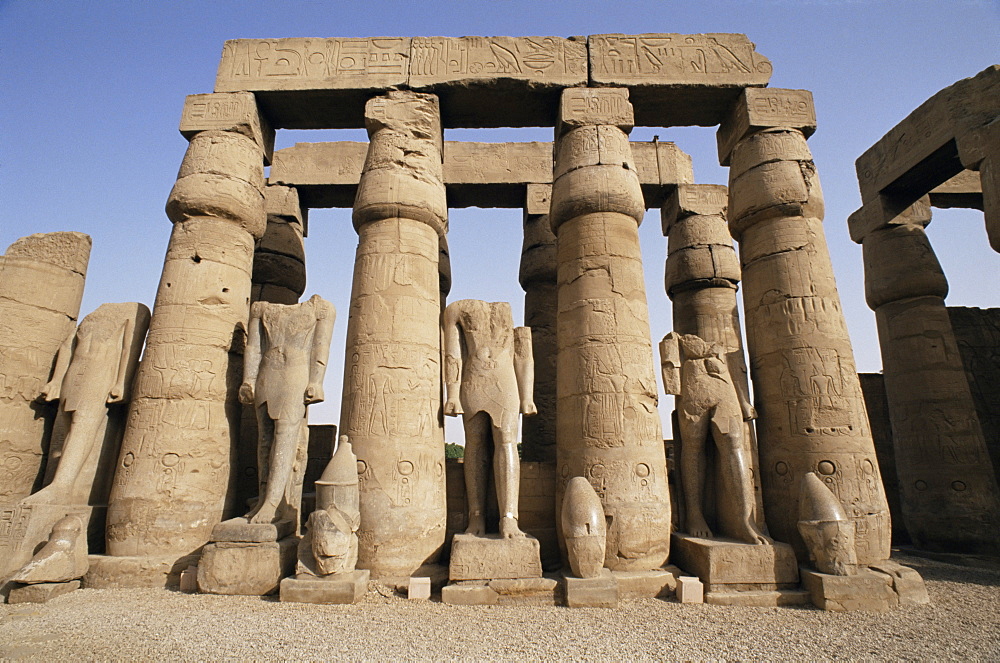 Osiris statues and Colonnade, Luxor Temple, Thebes, UNESCO World Heritage Site, Egypt, North Africa, Africa