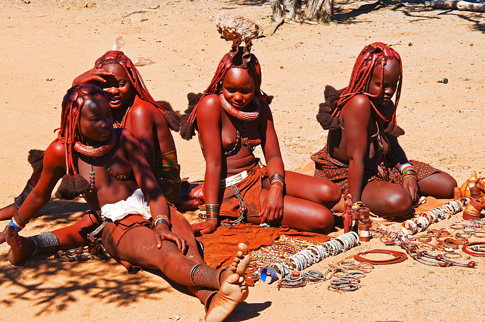 Himba women selling souvenirs, Kaokoveld, Namibia, Africa