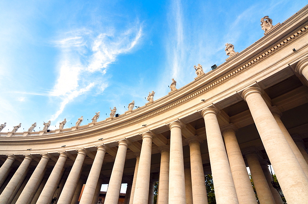 Bernini's 17th century colonnade and statues of saints, St. Peter's Square, Vatican City, UNESCO World Heritage Site, Rome, Lazio, Italy, Europe