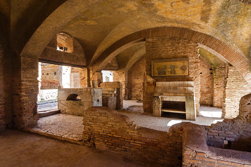 Thermopolium (Roman bar for hot food and drink), Ostia Antica archaeological site, Ostia, Rome province, Lazio, Italy, Europe