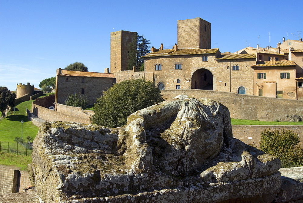 View of Tuscania from Bastianini Square and Etruscan sarcophagus, Latium, Italy, Europe