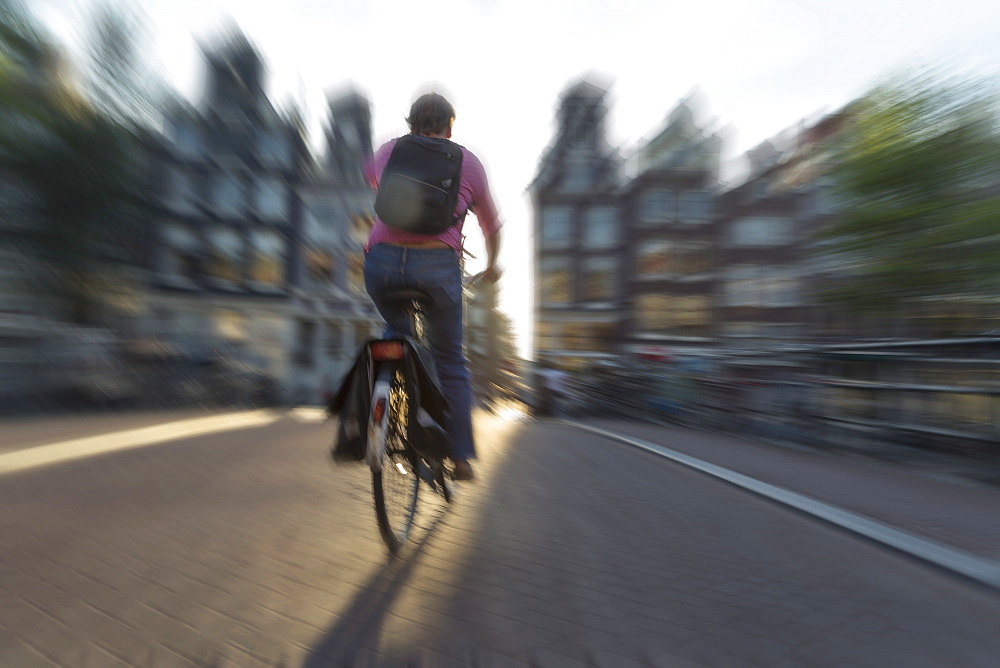 Cyclist, Amsterdam, The Netherlands, Europe