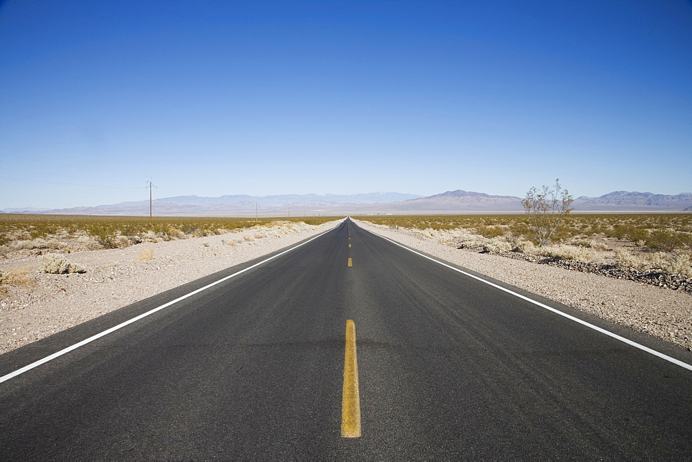 Empty road, Death Valley National Park, California, United States of America, North America