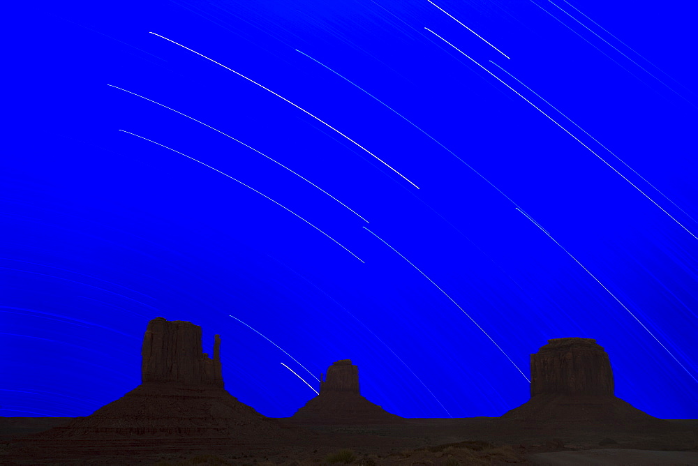 Long explosure resulting in star stripes in sky, Monument Valley Navajo Tribal Park, Arizona Utah border, United States of America, North America