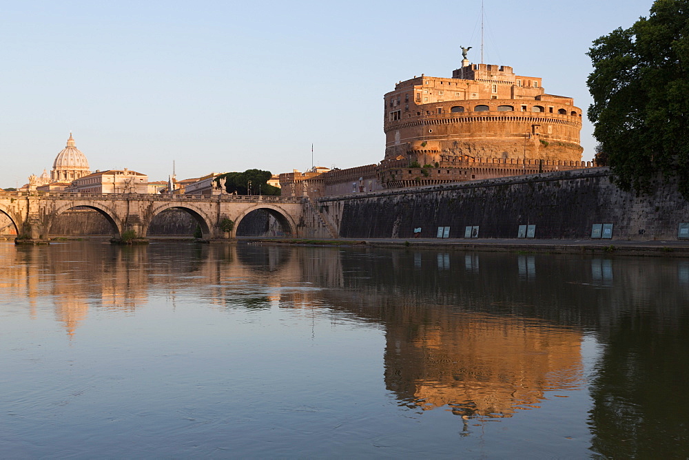 The River Tiber with Castel Sant' Angelo, Ponte Sant' Angelo bridge and the dome of St. Peter's Basilica, Rome, Lazio, Italy, Europe