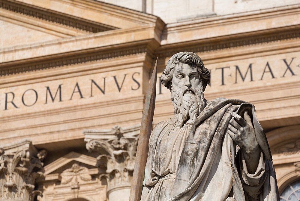 Statue and the facade of the Basilica of St. Peter's, UNESCO World Heritage Site, Vatican, Rome, Lazio, Italy, Europe