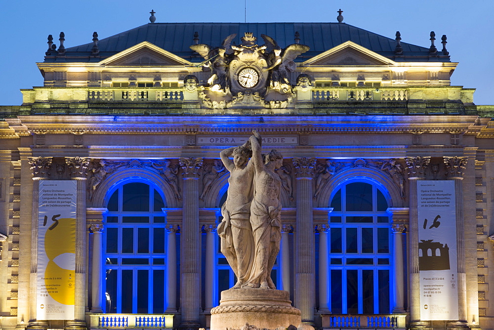 The Three Graces fountain and the Opera in Place de la Comedie in the city of Montpellier at night, Languedoc-Roussillon, France, Europe