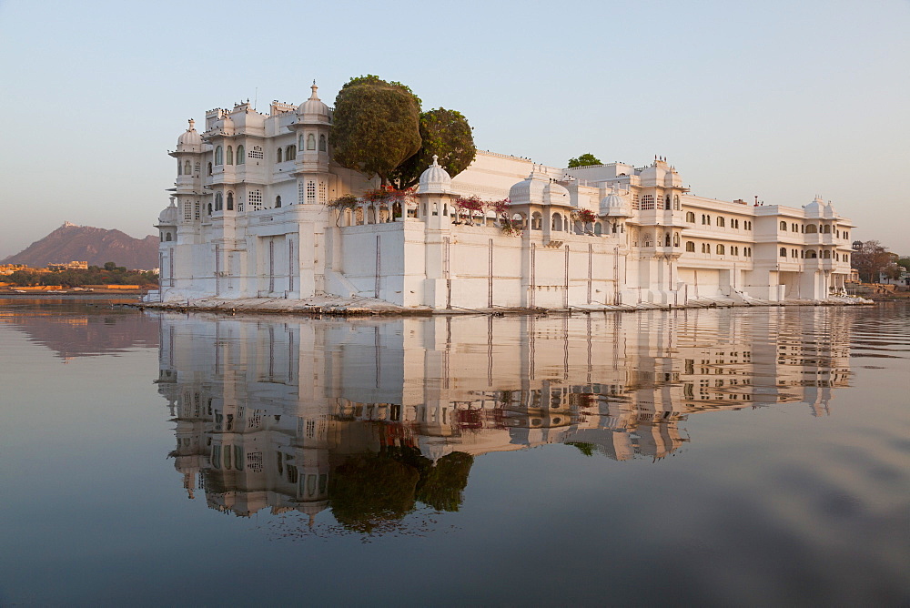 Perfect reflection of Lake Palace Hotel, situated in the middle of Lake Pichola, in Udaipur, Rajasthan, India, Asia