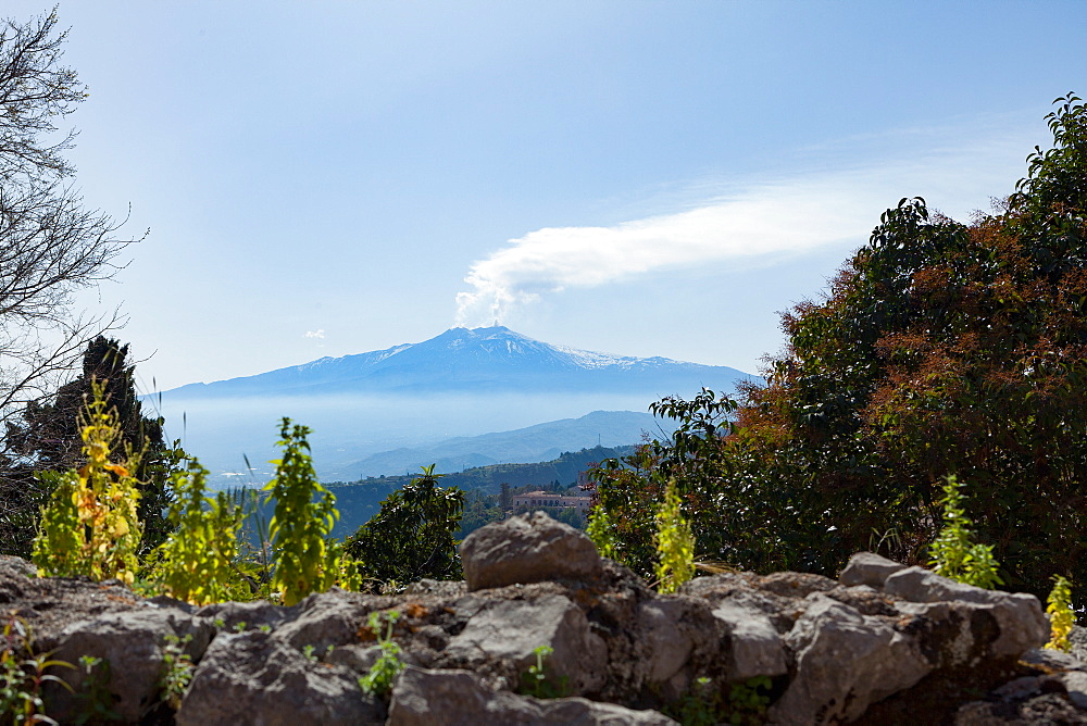 The awe inspiring Mount Etna, UNESCO World Heritage Site and Europe's tallest active volcano, seen from Taormina, Sicily, Italy, Mediterranean, Europe