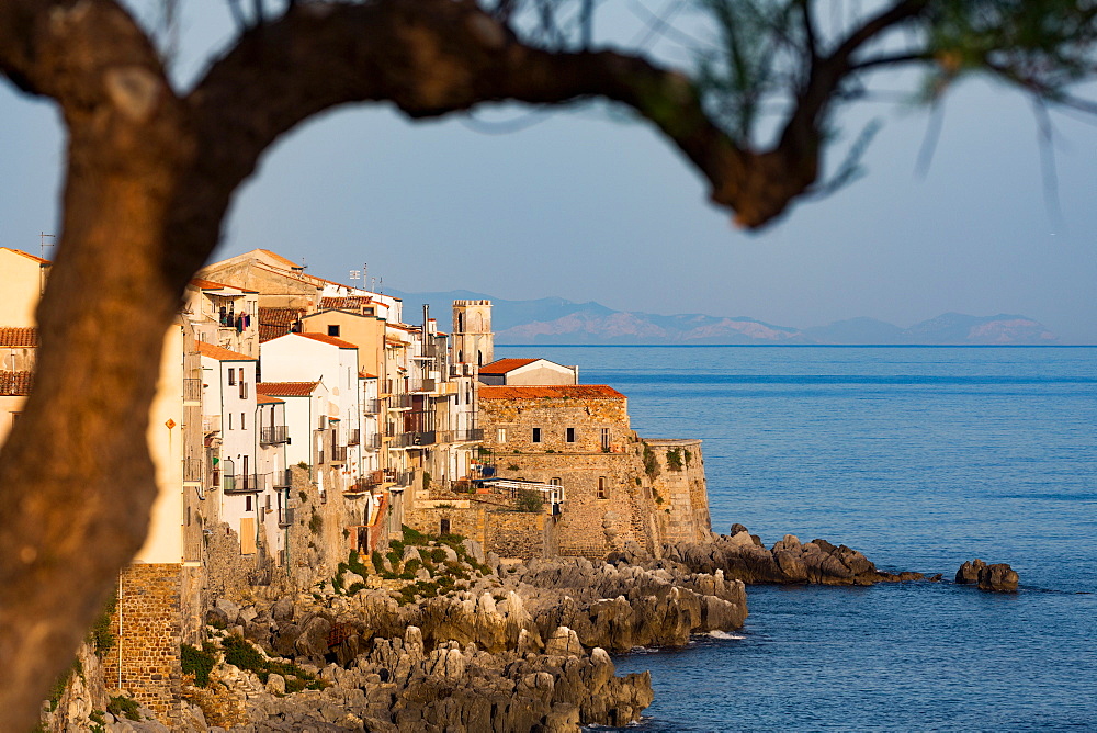 Historic houses on the rocky coastline of Cefalu, Sicily, Italy, Mediterranean, Europe