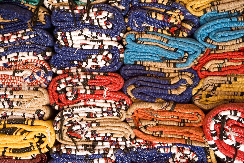 Rolled traditional rugs, Souk, Medina, Marrakech, Morocco, North Africa, Africa