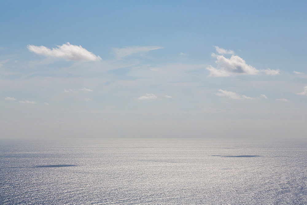 Clouds with shadows over a calm Mediterranean Sea, off Malta, Mediterranean, Europe