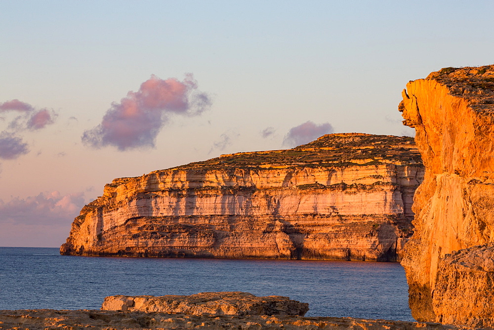 Dwejra Bay on the rugged Gozo coast in evening light, site of the fallen Azure Window, Gozo, Malta, Mediterranean, Europe