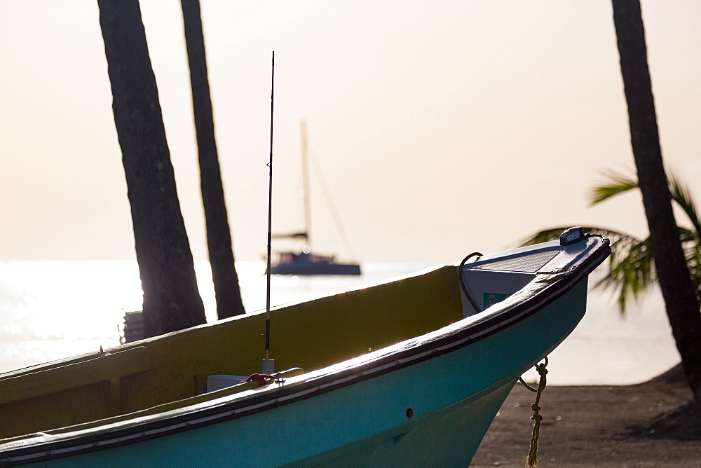 Traditional boat on the beach at Marigot Bay at dusk, St. Lucia, Windward Islands, West Indies Caribbean, Central America