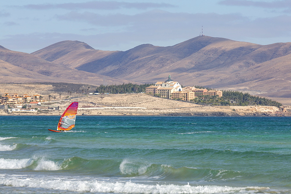 Wind-surfer off Playa de La Barca, Costa Calma, on the volcanic island of Fuerteventura, Canary Islands, Spain, Atlantic, Europe