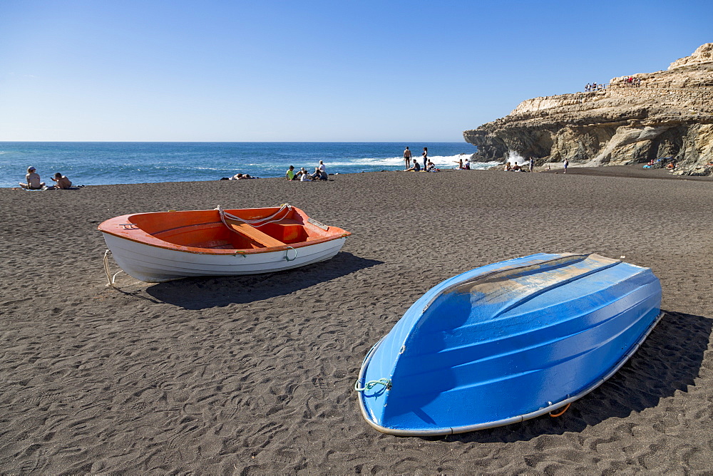 Small fishing boats on Playa Ajuy on the volcanic island of Fuerteventura, Canary Islands, Spain, Atlantic, Europe