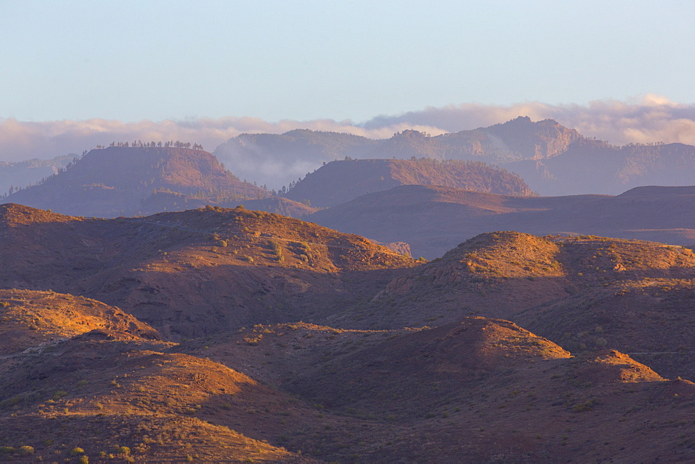 Looking towards the rugged mountains of Parque Natural Pilancones from near Maspalomas, Gran Canaria, Canary Islands, Spain, Atlantic, Europe