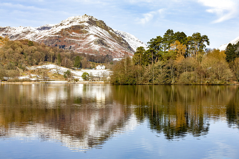 A perfect reflection of snow covered mountains and sky in the still waters of Grasmere, Lake District National Park, UNESCO World Heritage Site, Cumbria, England, United Kingdom, Europe