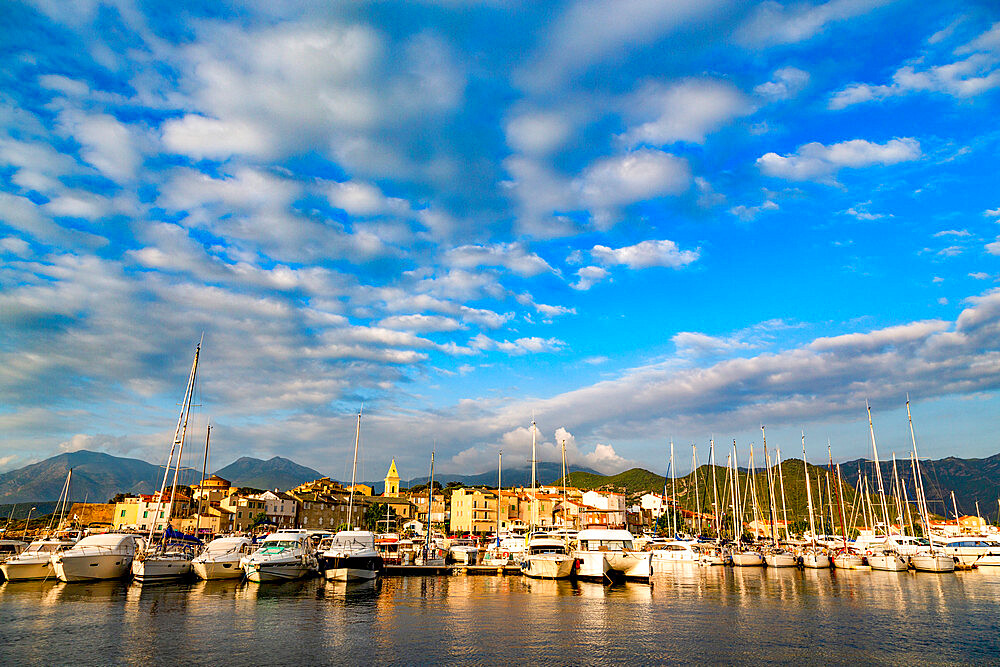 Boats moored in the small harbour of Saint Florent in northern Corsica, France, Mediterranean, Europe