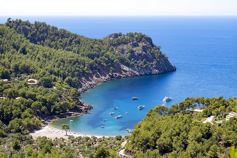 The secluded bay of Cala Tuent on the rugged north west coast of the Mediterranean island of Mallorca, Balearic Islands, Spain, Europe