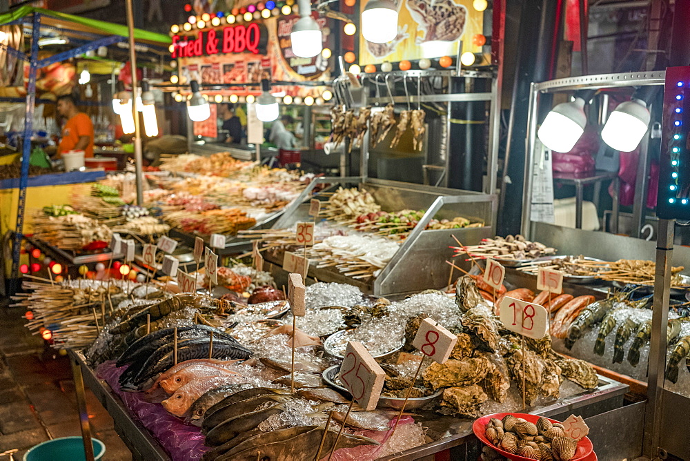 Fresh seafood for sale in Bukit Bintang food street at night in the capital city of Kuala Lumpur, Malaysia, Southeast Asia, Asia