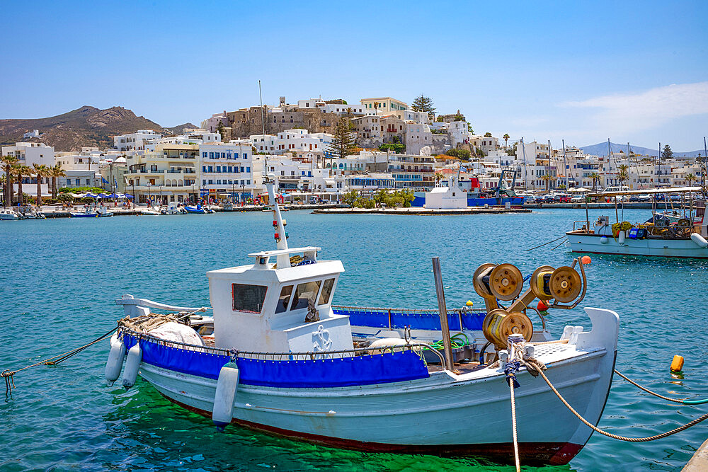 Traditional fishing boats moored in the harbour in Naxos Town, Naxos, the Cyclades, Aegean Sea, Greek Islands, Greece, Europe