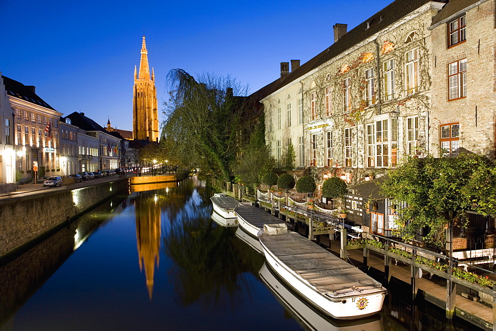 Canal in the evening and Church of our Lady, Bruges, Belgium, Europe