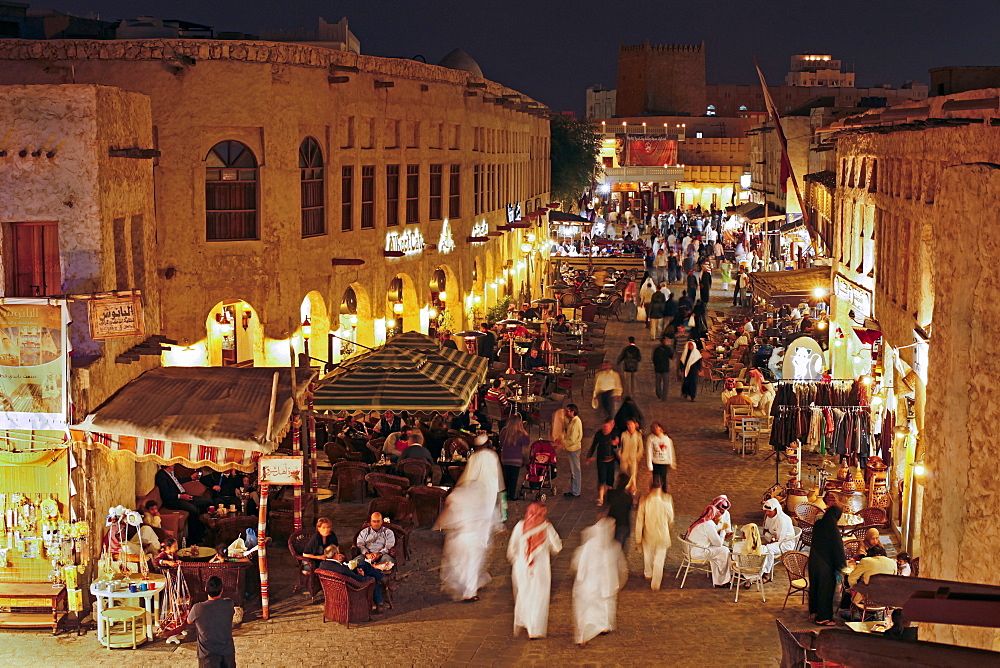 The restored Souq Waqif with mud rendered shops and exposed timber beams, Doha, Qatar, Middle East