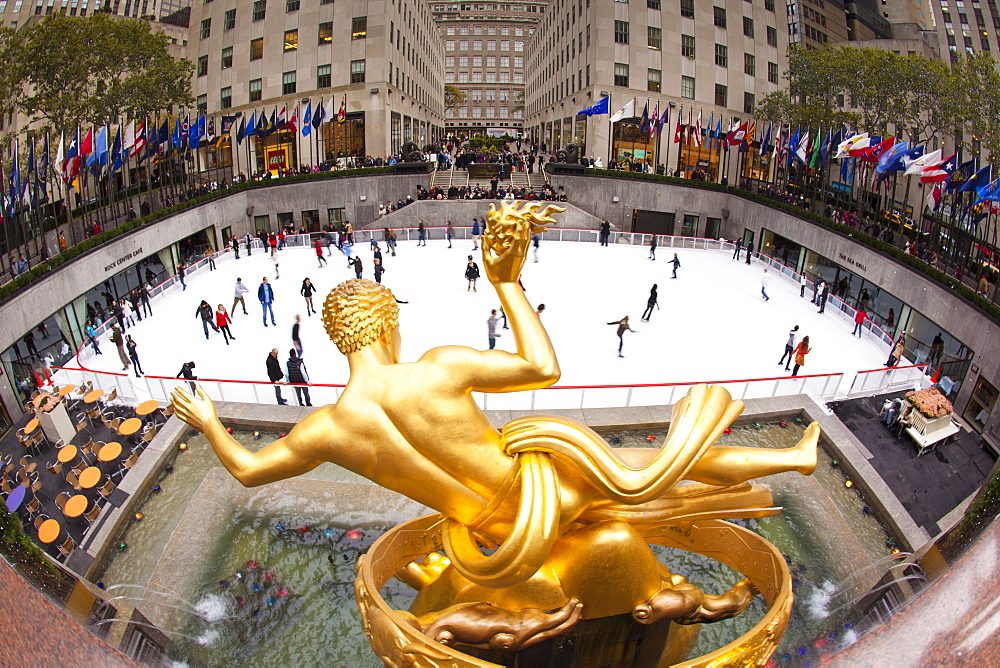 Ice skating rink below the Rockefeller Centre building on Fifth Avenue, New York City, New York, United States of America, North America