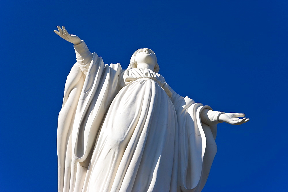 Statue of the Virgin Mary at Cerro San Cristobal overlooking the city, Santiago, Chile, South America