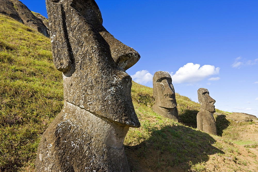 Giant monolithic stone Moai statues at Rano Raraku, Rapa Nui (Easter Island), UNESCO World Heritage Site, Chile, South America