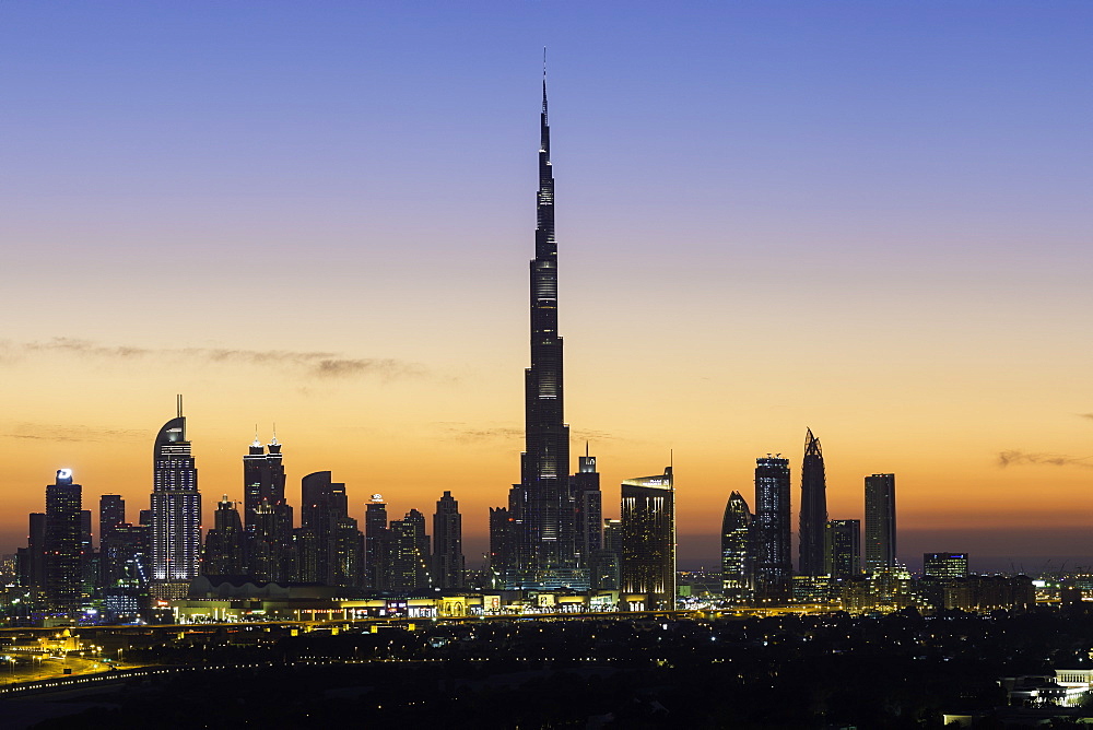 Elevated view of the new Dubai skyline, the Burj Khalifa, modern architecture and skyscrapers on Sheikh Zayed Road, Dubai, United Arab Emirates, Middle East